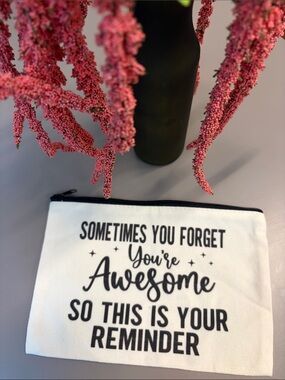 Source Unknown White Canvas Pouch with Black Lettering